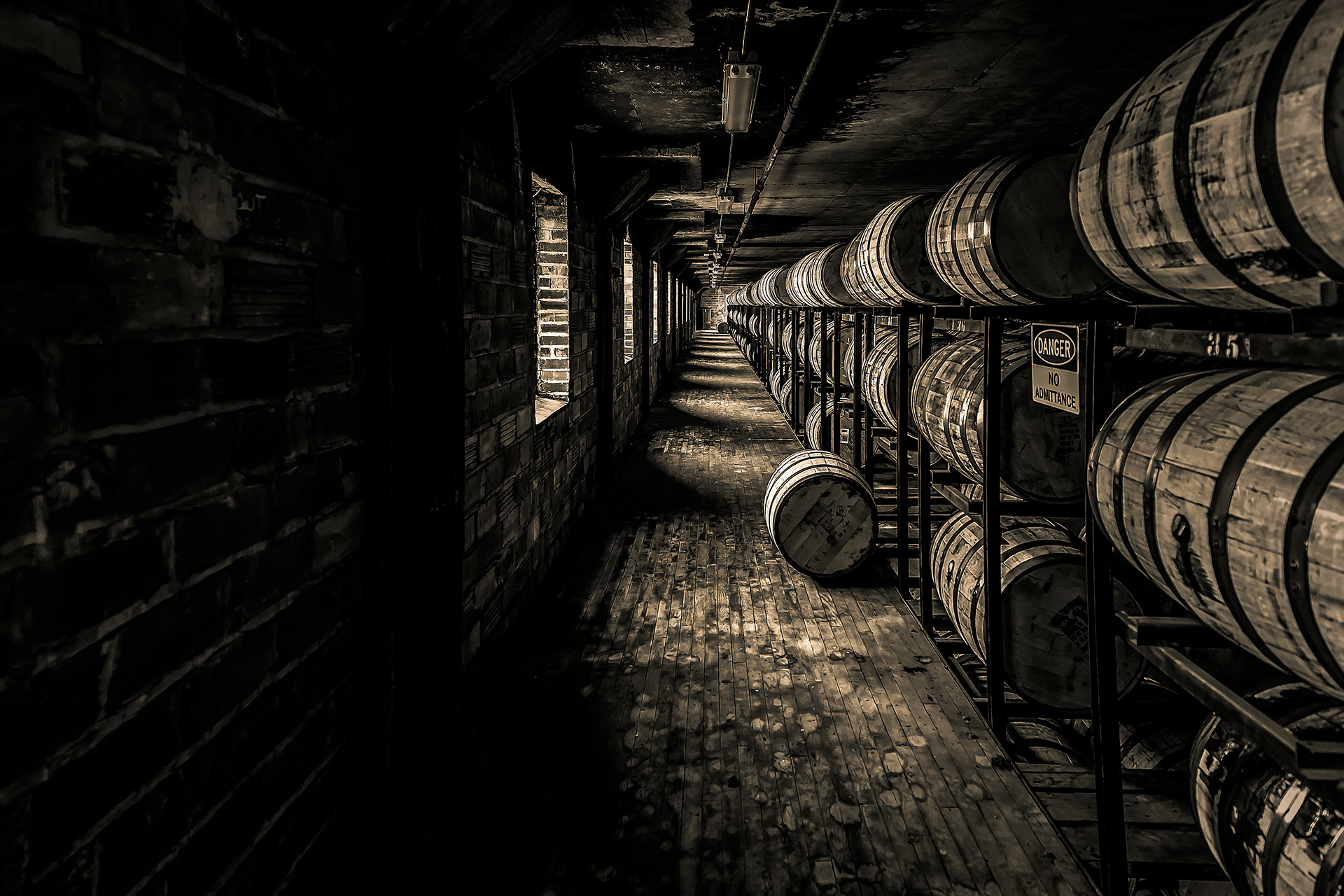 Rows of bourbon barrels Rows of bourbon barrels