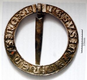 An image of a metal buckle with inscriptions on it, possibly from Boyerstown. An image of a metal buckle with inscriptions on it, possibly from Boyerstown.