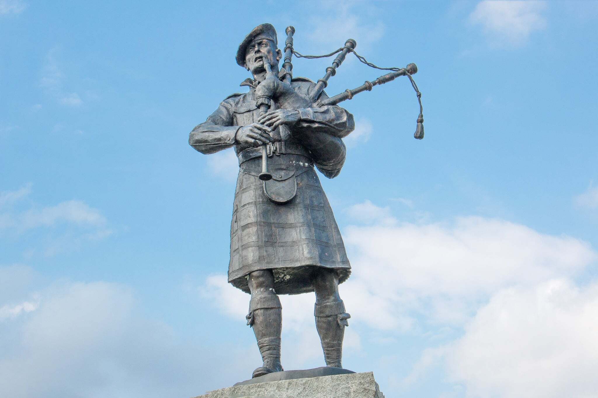 Memorial for the Highland Regiments bagpiper statue Memorial for the Highland Regiments bagpiper statue
