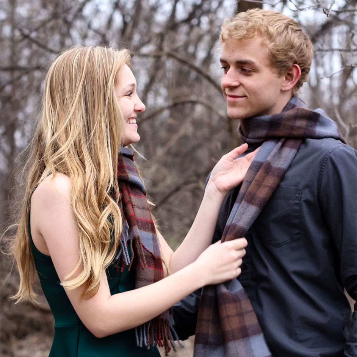 People wearing scarves made with Outlander inspired tartan People wearing scarves made with Outlander inspired tartan