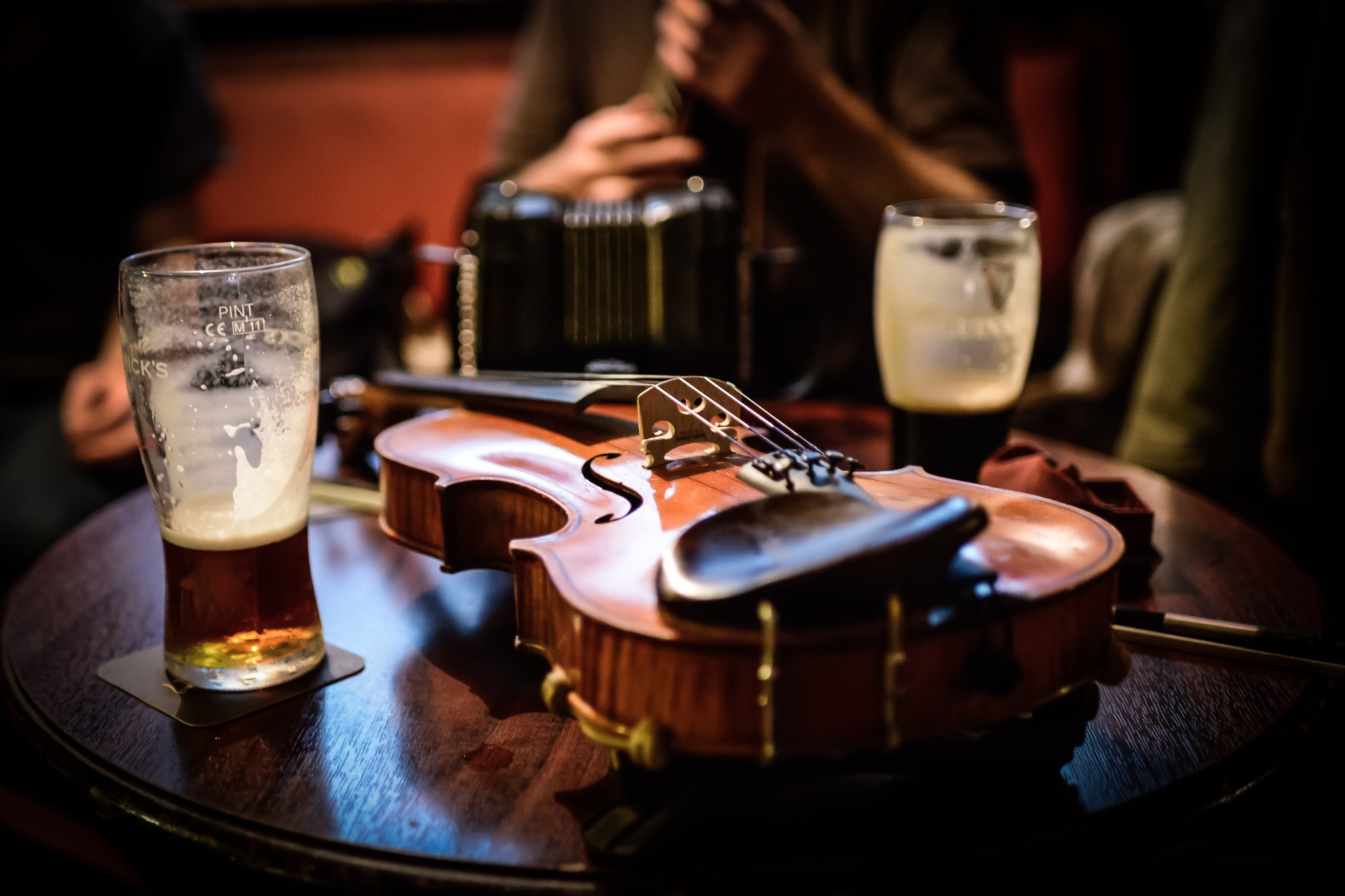 A violin on a table at an Irish pub. A violin on a table at an Irish pub.