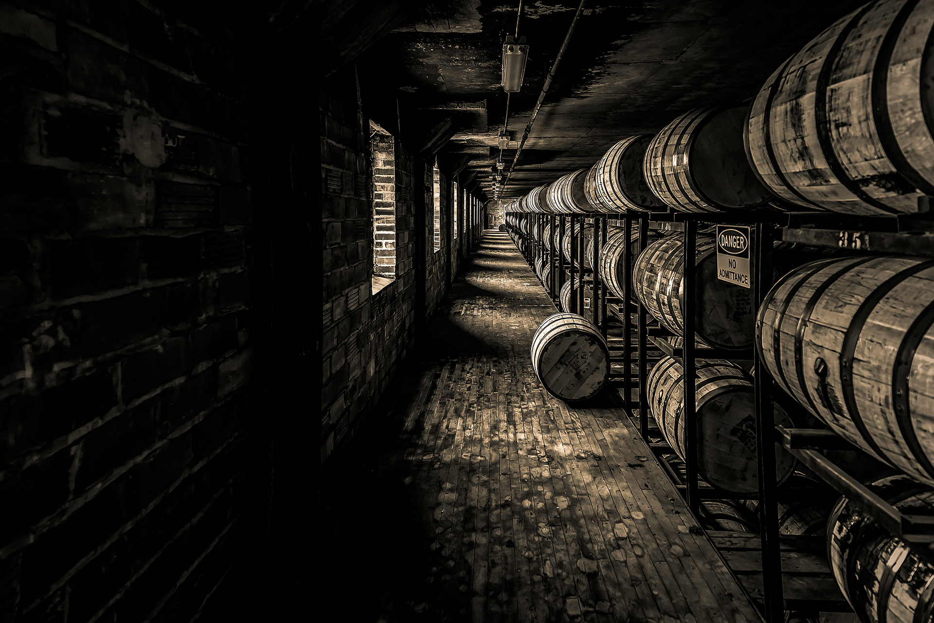 Rows of bourbon barrels 