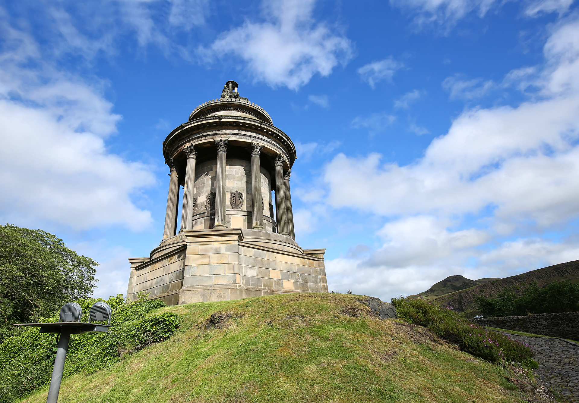 Robert Burns Monument on Regent Road in Edinburgh, Scotland.  Robert Burns is considered the National Poet of Scotland.