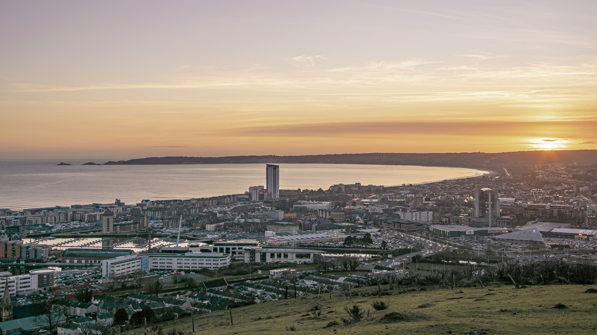 An aerial view of Swansea, one of the six cities in Wales.
